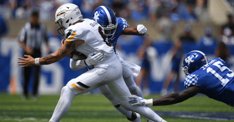 UK WLB DeAndre Square tackles Toledo QB Mitchell Guadagni during the University of Kentucky football game against Toledo at Kroger Field in Lexington, Kentucky on Saturday, August 31, 2019. (© Mike Weaver/Special to Courier Journal, Louisville Courier Journal via Imagn Content Services, LLC)