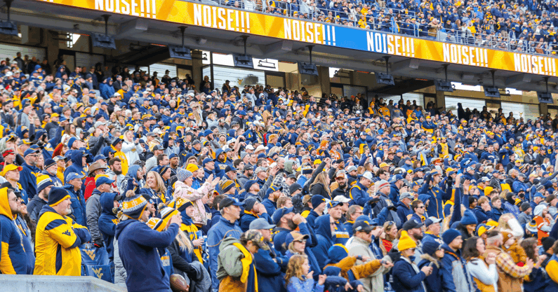 West Virginia football fans cheer on their team