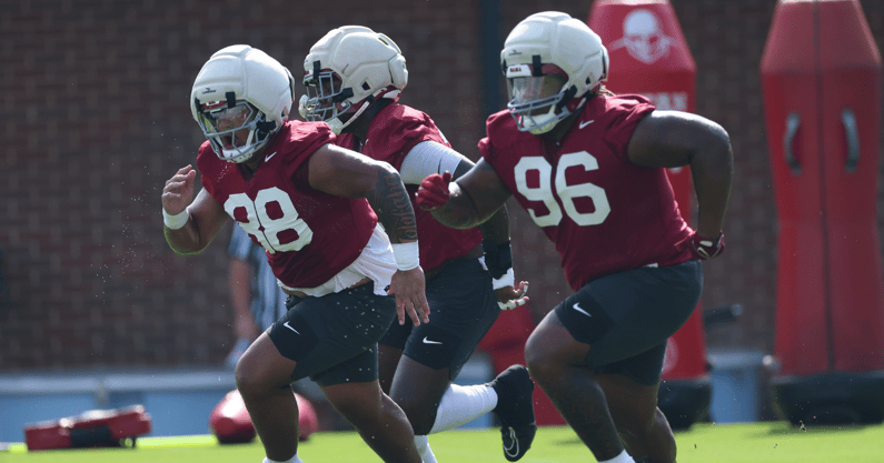 Alabama DL Isaia Faga and Tim Keenan