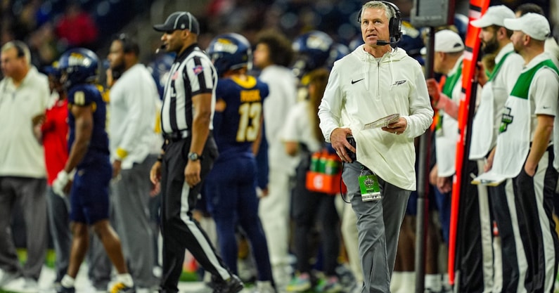 Toledo Rockets head coach Jason Candle walks the sideline after not getting the first down, during the first half of the 2024 GameAbove Sports Bowl at Ford Field in Detroit, Thursday, Dec. 26, 2024. (© Kimberly P. Mitchell / USA TODAY NETWORK via Imagn Images)