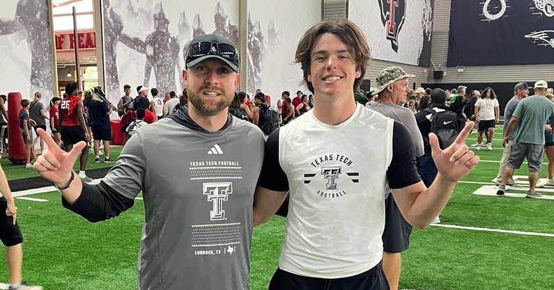 2028 DB Nolan Hawkins with Texas Tech safeties coach Rob Greene