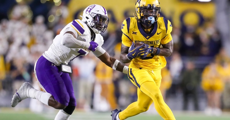 West Virginia Mountaineers wide receiver Jaden Bray (5) catches a pass and runs for extra yards during the third quarter against the Albany