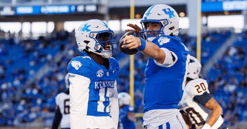 Nov 16, 2024; Lexington, Kentucky, USA; Kentucky Wildcats quarterback Cutter Boley (8) and wide receiver Hardley Gilmore IV (17) celebrate a first down during the third quarter against the Murray State Racers at Kroger Field. Mandatory Credit: Jordan Prather-Imagn Images