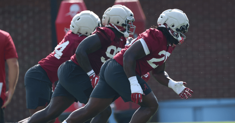 Alabama DL Fatutoa Henry, Jeremiah Beaman and Steve Mboumoua