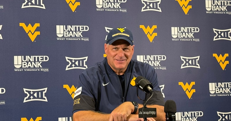 West Virginia head coach Rich Rodriguez talks with the media following the Robert Morris win