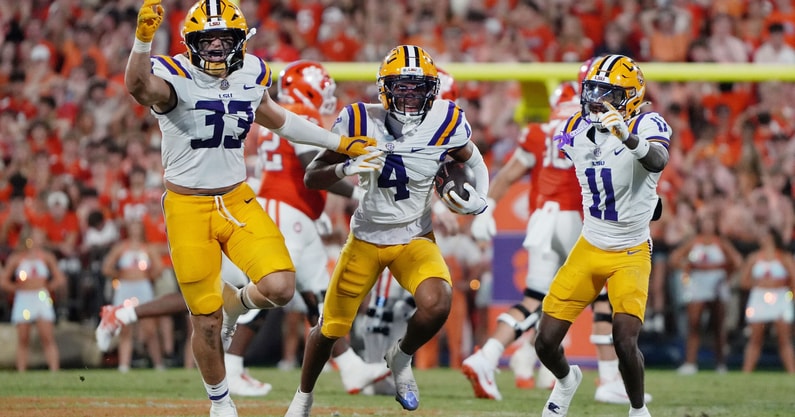 LSU's defense stood tall vs. Clemson, the offense rallied from behind, and the Tigers snapped the Week 1 curse (Photo: USA Today)