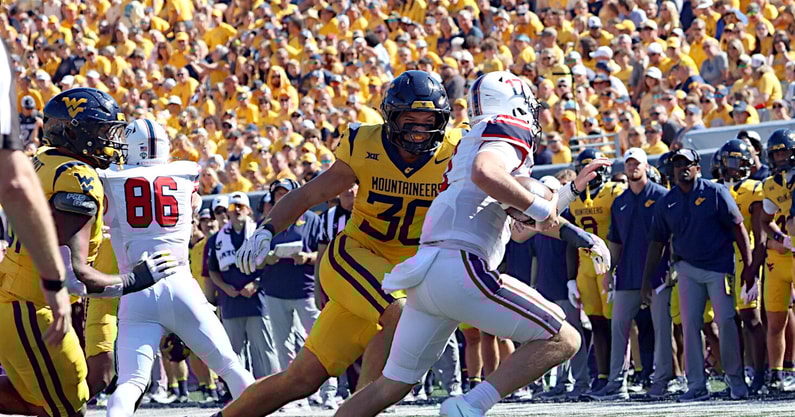 West Virginia linebacker Chase Wilson closes in on the quarterback