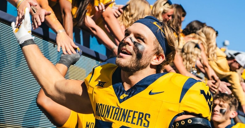 West Virginia linebacker Chase Wilson celebratest the win over Robert Morris