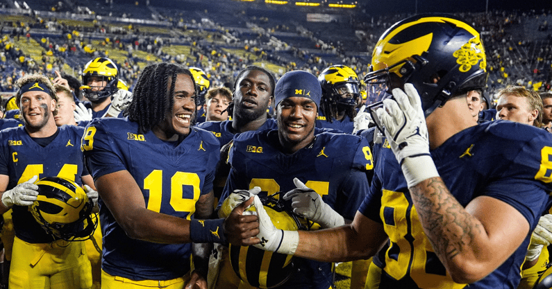 Michigan Wolverines football TE Max Bredeson, QB Bryce Underwood, EDGE Nate Marshall and TE Deakon Tonielli after a win over New Mexico. (Photo by Junfu Han / USA TODAY NETWORK via Imagn Images)