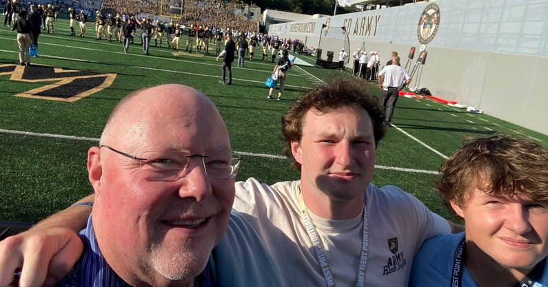 Army commit Malcolm Roberts with dad and younger brother A