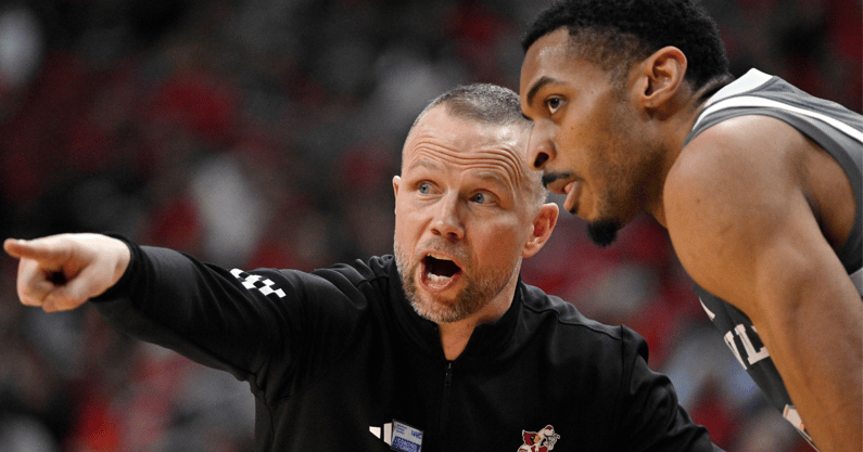 Jan 28, 2025; Louisville, Kentucky, USA; Louisville Cardinals head coach Pat Kelsey talks with center Frank Anselem-Ibe (13) during the second half against the Wake Forest Demon Deacons at KFC Yum! Center. Louisville defeated Wake Forest 72-59. Mandatory Credit: Jamie Rhodes-Imagn Images