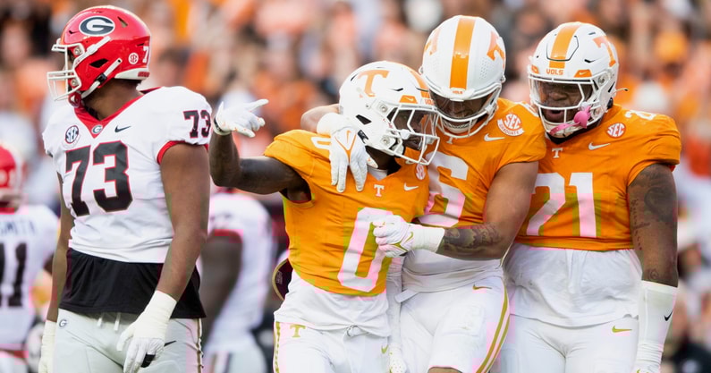 Tennessee defensive back Doneiko Slaughter (0), Tennessee linebacker Aaron Beasley (6) and Tennessee defensive lineman Omari Thomas (21) celebrate during a football game between Tennessee and Georgia at Neyland Stadium in Knoxville, Tenn., on Saturday, Nov. 18, 2023.