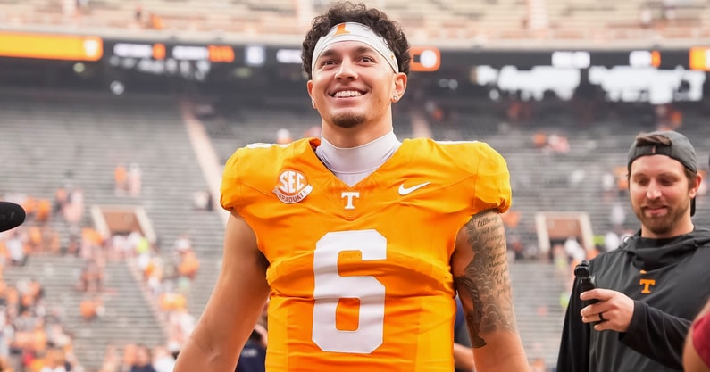 Tennessee quarterback Joey Aguilar (6) smiles as he walks off the field toward his family after Tennessee's home opener against ETSU at Neyland Stadium in Knoxville, Tenn., on Sept. 6, 2025.