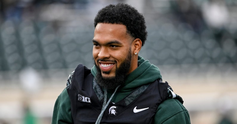 Michigan State's Nikai Martinez smiles while watching the team warm up before the football game against Boston College on Saturday, Sept. 6, 2025, at Spartan Stadium in East Lansing. - Nick King, USA TODAY Sports