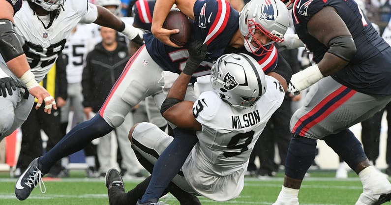 Sep 7, 2025; Foxborough, Massachusetts, USA; Las Vegas Raiders defensive end Tyree Wilson (9) sacks New England Patriots quarterback Drake Maye (10) during the second half at Gillette Stadium. Mandatory Credit: Bob DeChiara-Imagn Images
