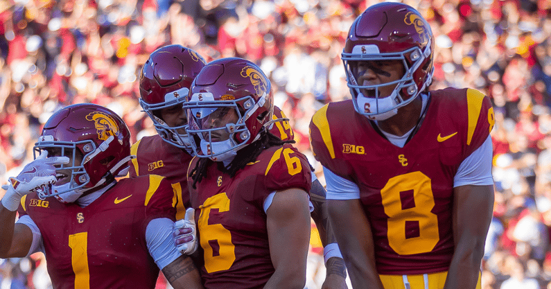 USC players Eli Sanders, Jayden Maiava, Makai Lemon and Ja'Kobi Lane celebrate a Trojan touchdown