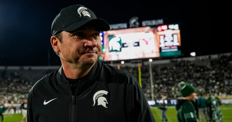 Michigan State head coach Jonathan Smith walks across the field following a double-overtime victory over Boston College at Spartan Stadium. - Brendan Mullin, USA TODAY Sports