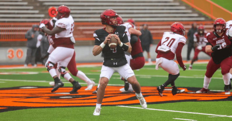 Logan Fife drops back to pass in practice