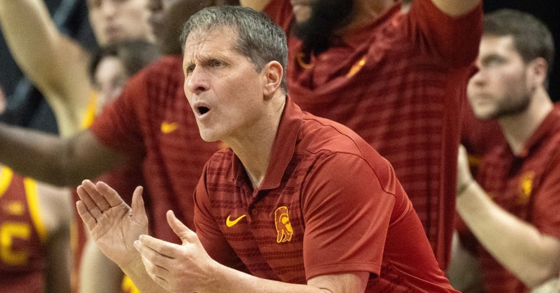 USC coach Eric Musselman cheers his team during the first half against Oregon