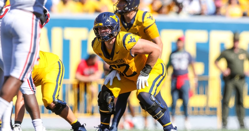 West Virginia offensive lineman Phillip Bowser before the snap