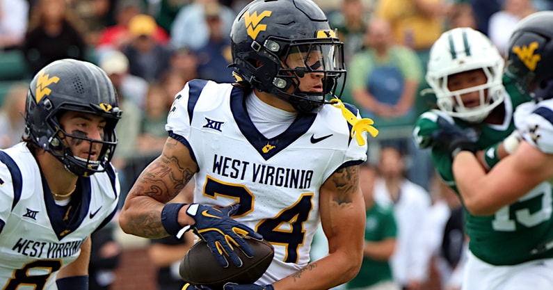 West Virginia wide receiver Rodney Gallagher with the carry