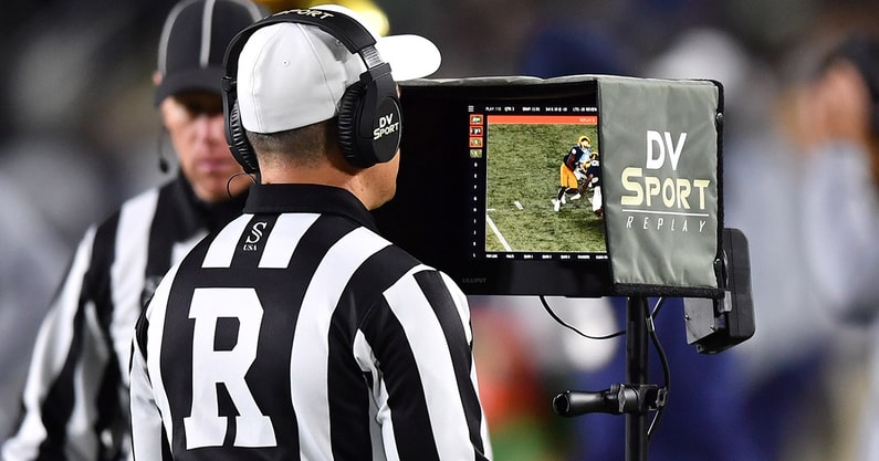A referee during a replay review
