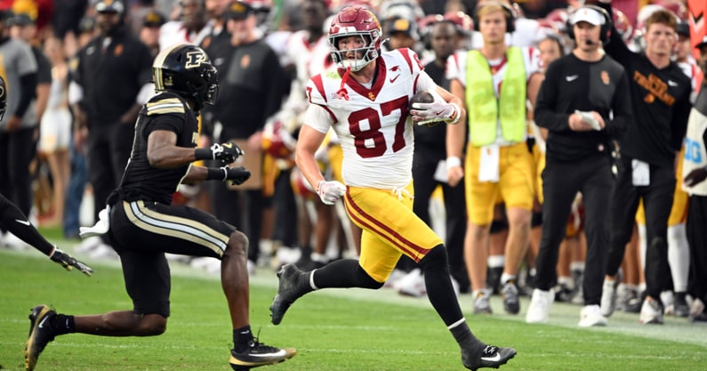 USC Trojans tight end Lake McRee (87) looks to get past Purdue Boilermakers defensive back Tony Grimes (0) during the second quarter at Ross-Ade Stadium