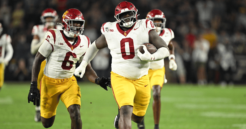 USC Trojans defensive tackle Jamaal Jarrett (0) runs the ball in for a touchdown after intercepting it during the second half against the Purdue Boilermakers at Ross-Ade Stadium