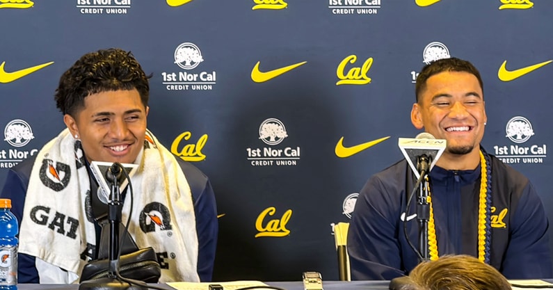 Cal quarterback Jaron-Keawe Sagapolutele and receiver Jacob De Jesus