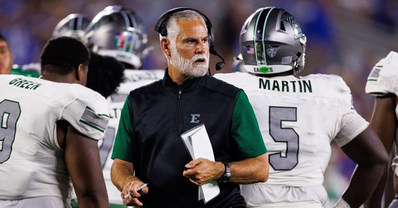Sep 13, 2025; Lexington, Kentucky, USA; Eastern Michigan Eagles head coach Chris Creighton looks on during the second quarter against the Kentucky Wildcats at Kroger Field. Mandatory Credit: Jordan Prather-Imagn Images