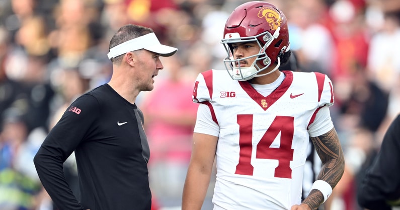 USC Trojans quarterback Jayden Maiava (14) talks with Southern California Trojans head coach Lincoln Riley before the game against the Purdue Boilermakers at Ross-Ade Stadium