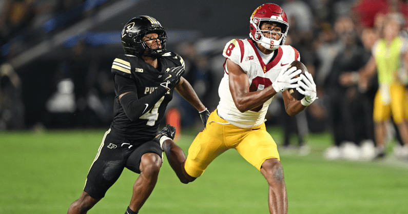 USC Trojans wide receiver Ja'Kobi Lane (8) catches a pass in front of Purdue Boilermakers defensive back Hudauri Hines (4) during the second half at Ross-Ade Stadium