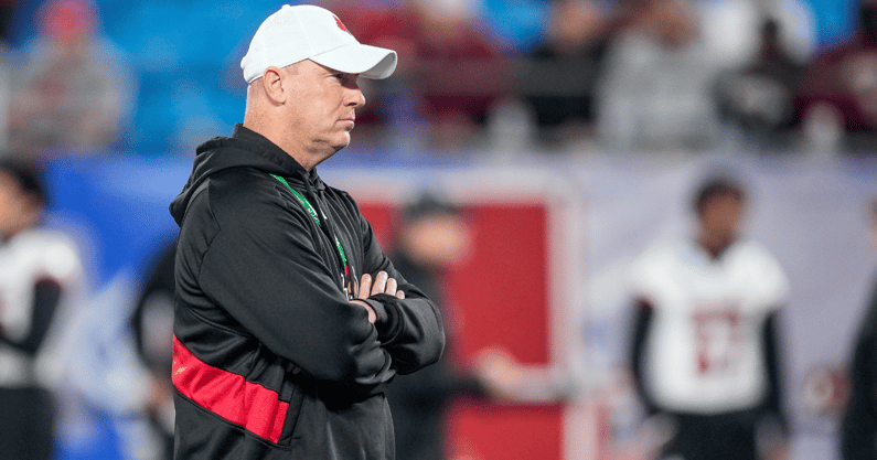Dec 2, 2023; Charlotte, NC, USA; Louisville Cardinals head coach Jeff Brohm during warm ups against the Florida State Seminoles at Bank of America Stadium. Mandatory Credit: Jim Dedmon-Imagn Images