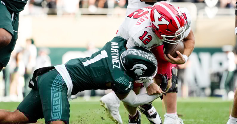 Michigan State defensive back Nikai Martinez (1) tackles Youngstown State quarterback Beau Brungard (12) in the third quarter at Spartan Stadium. - Brendan Mullin, USA TODAY Sports
