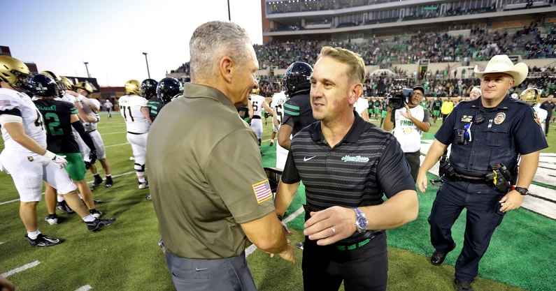 North Texas Mean Green head coach Eric Morris greets Army Black Knights head coach Jeff Monken after Army’s 14-3 win during the second half at DATCU Stadium. Mandatory Credit- Danny Wild-Imagn Images A