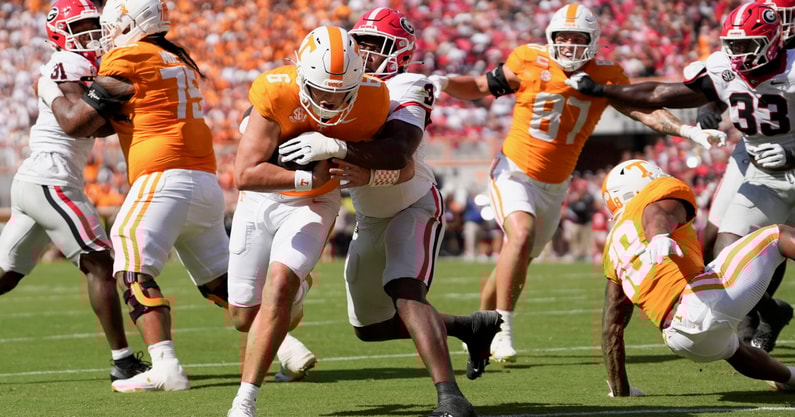 News Sentinel / USA TODAY NETWORK via Imagn Images | Tennessee quarterback Joey Aguilar (6) runs the ball in for the game's first touchdown during an NCAA college football game against Georgia on September 13, 2025, Knoxville, Tennessee.