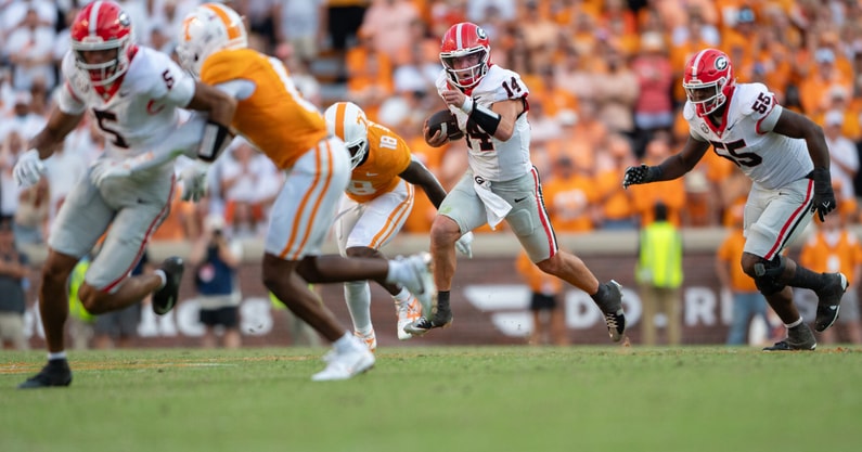 Gunner Stockton carries the ball against Tennessee.