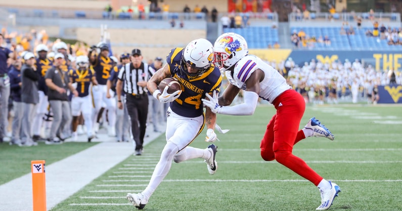 West Virginia wide receiver Rodney Gallagher scores against Kansas in 2024