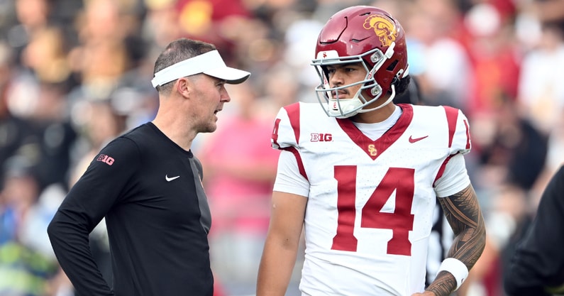 Southern California Trojans quarterback Jayden Maiava (14) talks with Southern California Trojans head coach Lincoln Riley before the game against the Purdue Boilermakers at Ross-Ade Stadium. - Marc Lebryk, USA TODAY Sports