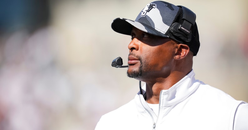 Sep 6, 2025; Cincinnati, Ohio, USA; Bowling Green Falcons head coach Eddie George works to the sideline against the Cincinnati Bearcats in the first half at Nippert Stadium. Mandatory Credit: Aaron Doster-Imagn Images