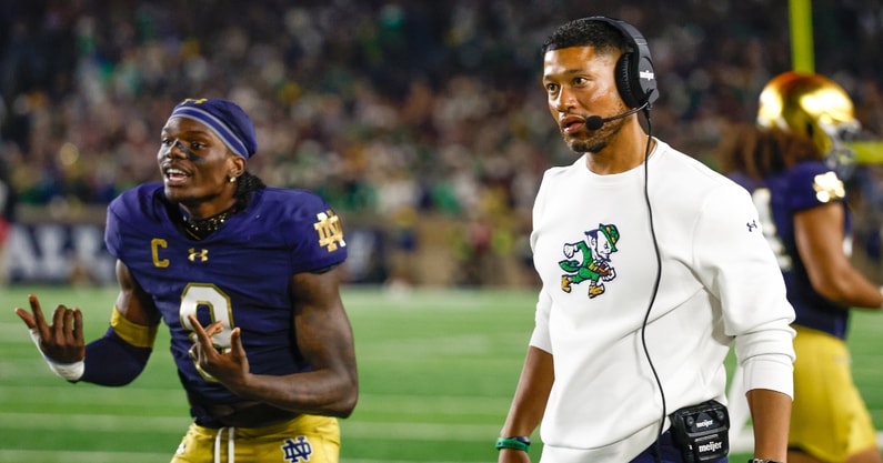 Notre Dame coach Marcus Freeman and safety Adon Shuler