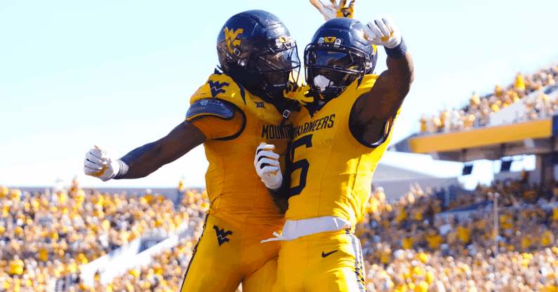 West Virginia's players celebrate the touchdown
