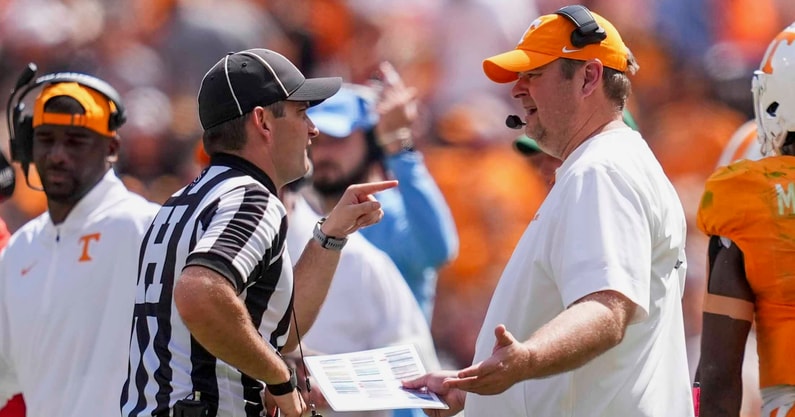 Angelina Alcantar/News Sentinel / USA TODAY NETWORK via Imagn Images | The referee points at Tennessee coach Josh Heupel during a NCAA football game between Tennessee and UAB at Neyland Stadium in Knoxville, Tenn., September 20, 2025.