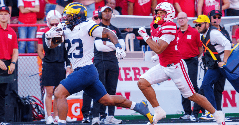 Nebraska football defensive back Donovan Jones chases Michigan RB Jordan Marshall during a 54-yard touchdown run in the Wolverines' 30-27 win over the Huskers