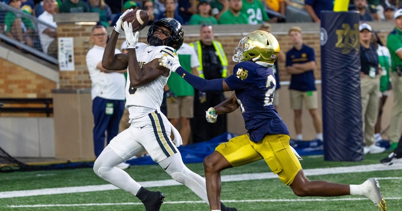 Notre Dame CB Mark Zackery chases Purdue WR Nitro Tuggle