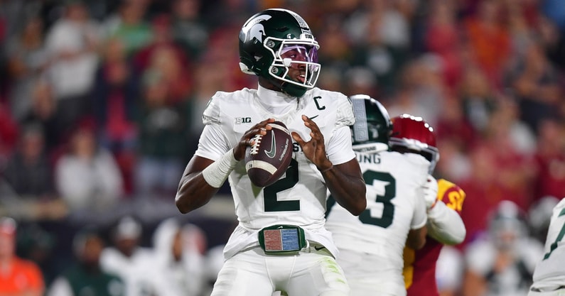 Michigan State Spartans quarterback Aidan Chiles (2) drops back to pass against the Southern California Trojans during the second half at the Los Angeles Memorial Coliseum. - Gary A. Vasquez, USA TODAY Sports