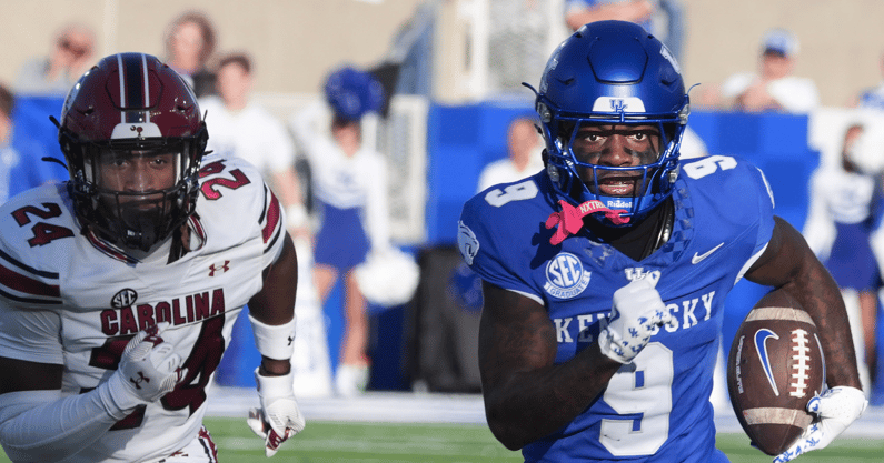 Kentucky’s Dane Key runs after he catches the ball against South Carolina’s Jalon Kilgore Saturday at Kroger Field in Lexington. Sept. 7, 2024. (© Scott Utterback/Courier Journal / USA TODAY NETWORK)
