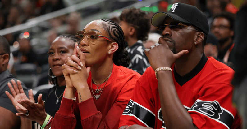 Jul 18, 2025; Indianapolis, IN, USA; Las Vegas Aces forward A’ja Wilson and boyfriend Miami Heat player Bam Adebayo watch the three-point contest during the 2025 WNBA All Star Skills Challenge at Gainbridge Fieldhouse. Mandatory Credit: Trevor Ruszkowski-Imagn Images