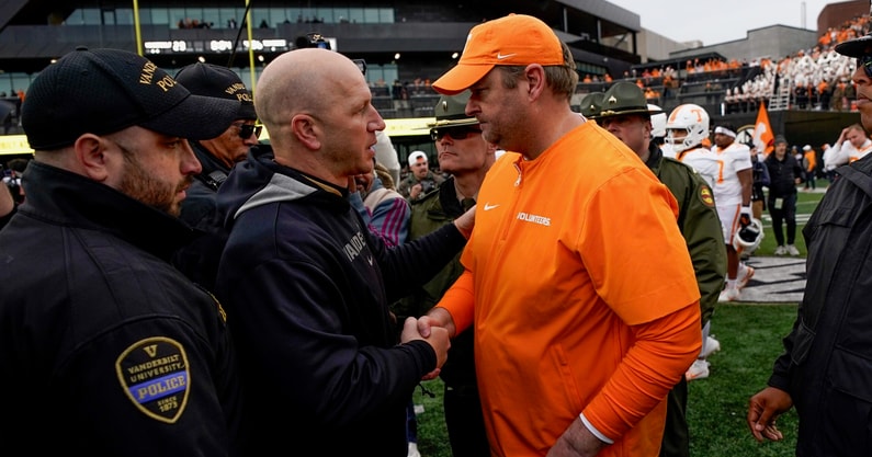 Andrew Nelles / The Tennessean / USA TODAY NETWORK via Imagn Images Vanderbilt head coach Clark Lea greets Tennessee head coach Josh Heupel after the game at FirstBank Stadium in Nashville, Tenn., Saturday, Nov. 30, 2024.