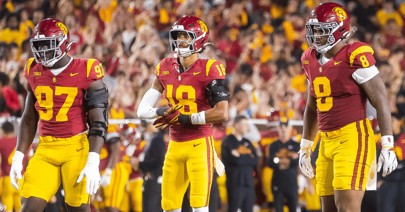 USC defenders Jide Abasiri, Eric Gentry and Devan Thompkins